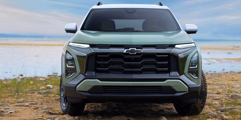 Front view of 2025 Chevy Equinox near a body of water