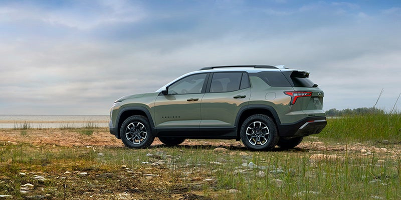 Side view of 2025 Chevy Equinox near a body of water